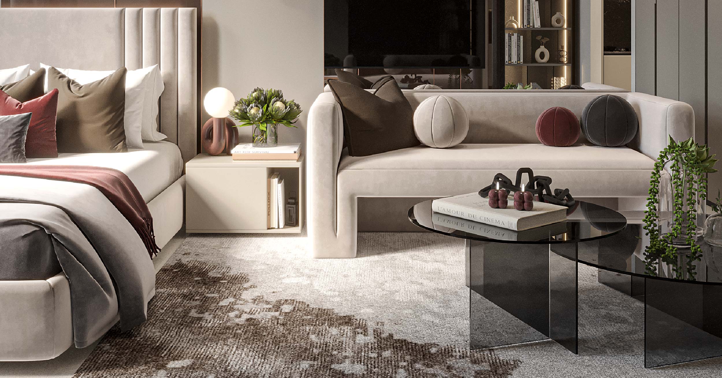 Hyde Walk By Imtiaz A stylish bedroom and living area featuring a bed, plush sofa, coffee table, decorative pillows, and plants.